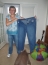 Me holding my size 26 jeans